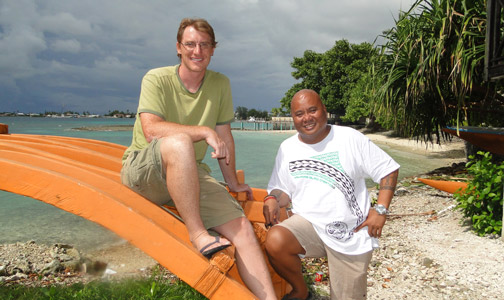 Researcher of Marshallese navigation Joe Genz with WAM Director Alson Kelen at the Canoe House alongside Majuro lagoon. Photo credit Karen Earnshaw