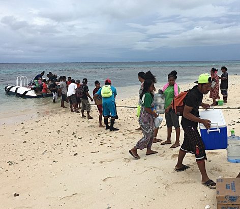 WAM trainees and staff bringing provisions ashore. Photo: Alson Kelen