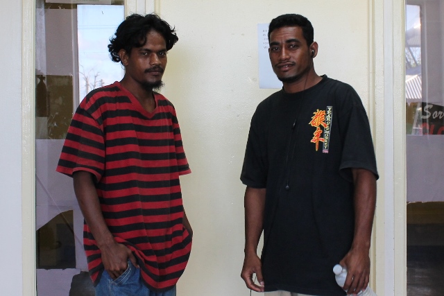 Alumni Coon Anitak, left, was a WAM trainee in 2013 and is now a trainer in MIDB Self-Help building program. At right is Peter Janer, who was in the same training program as Coon and also was hired on by the MIDB Self-Help building program.