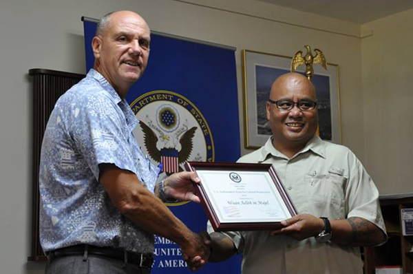 US Ambassador Tom Armbruster with WAM Director Alson Kelen during the Award Ceremony of the 2014 Ambassador's Award for Cultural Preservation.