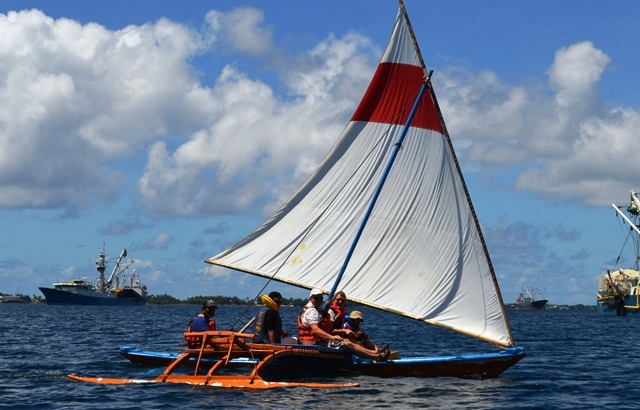 Olli-Pekka and Auli Ollila take their grandson Gideon for a smooth ride on a WAM canoe. Photo: Karen Earnshaw