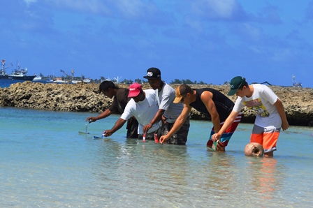 Davidson David, Binton Daniel, Linton Baso, Grant Bilyard and his son Tayne in the grand final of the Mieco Beach Yacht Club Recycle Can Race. Photo: Karen Earnshaw