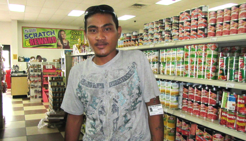 WAM 2015 alumni Jamison Jack working at the Payless Supermarket. Photo: Tolina Tomeing