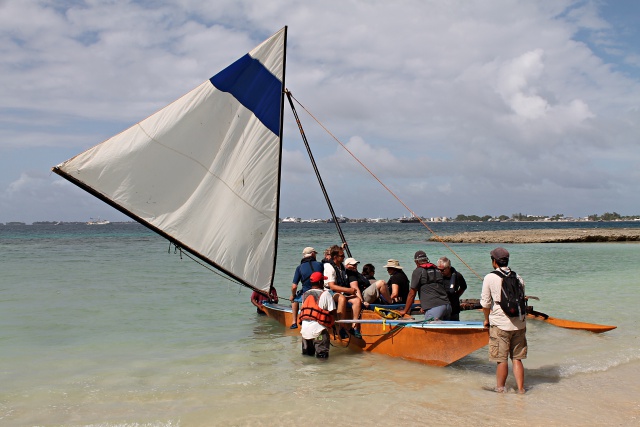 Peace Boat cruisers enjoy a canoe ride at WAM. Photo: Tolina Tomeing
