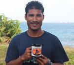 Linton Baso our new Program Manager with a WAM mug. Photo: Tamie Bowman