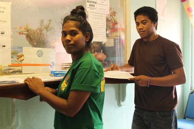 WAM Trainees Helenty Hemos and Jeson Lavine applying for birth certificates. Photo: Tolina Tomeing