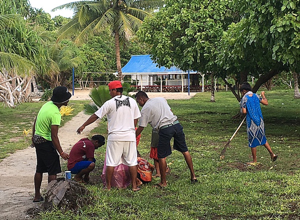 Group cleanup each day. Photo: Alson Kelen