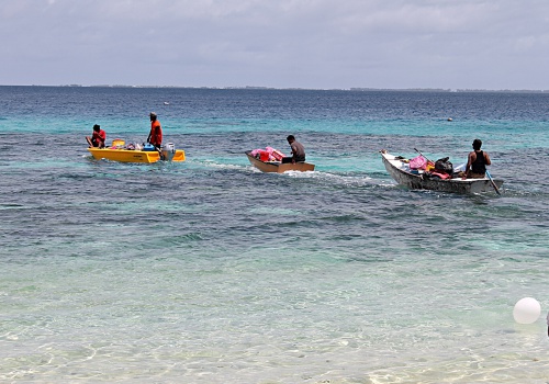 Trainees help with transport of provisions to Eneko. Photo: Suemina Bohanny