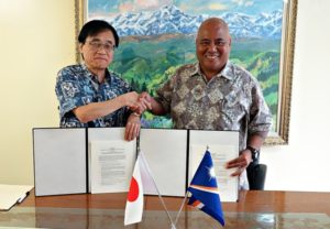 Japan Ambassador Hideyuki Mitsuoka and Director of WAM Alson Kelen with signed agreement. Photo: Embassy staff member