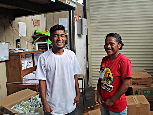 Trainees Danny Henry and Susan Edward at EzPrice during OJT. Photo: Sealand Laiden